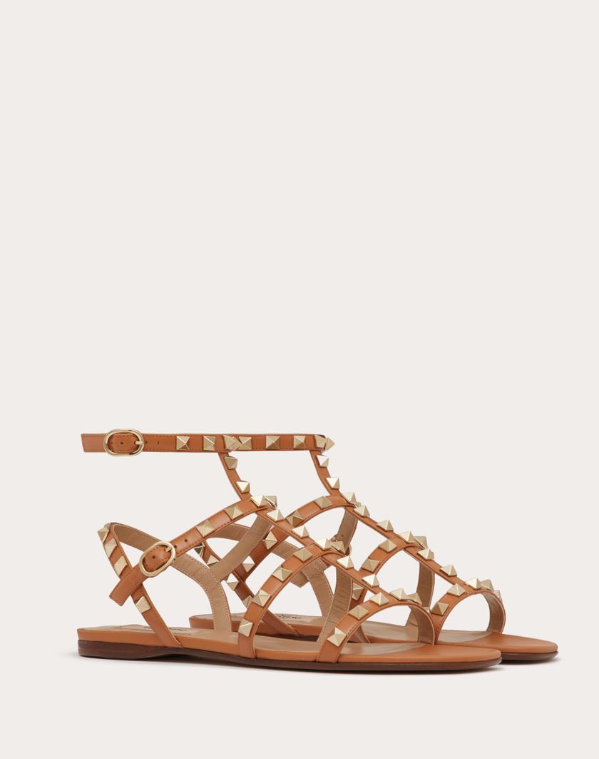 ROCKSTUD FLAT CALFSKIN SANDAL WITH STRAPS - Image 1